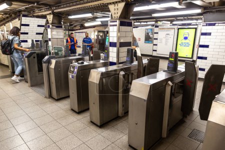 Photo for LONDON, THE UNITED KINGDOM - JUNE 26, 2022: Ticket barrier - turnstile gates at Baker street underground station in London, England, UK - Royalty Free Image