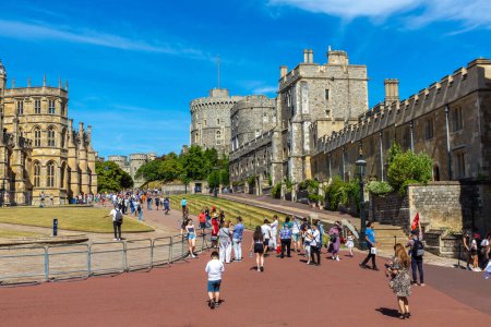 Photo for WINDSOR, UK - JUNE 19, 2022: Tourists in the courtyard of the Windsor Castle in Windsor in a sunny summer day, UK - Royalty Free Image