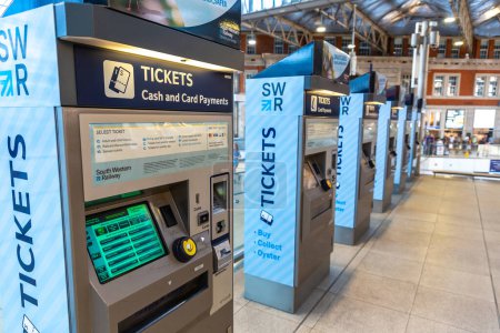 Photo for LONDON, THE UNITED KINGDOM - JUNE 26, 2022: Self service tickets machine at  Waterloo train station in a summer day in London, England, UK - Royalty Free Image