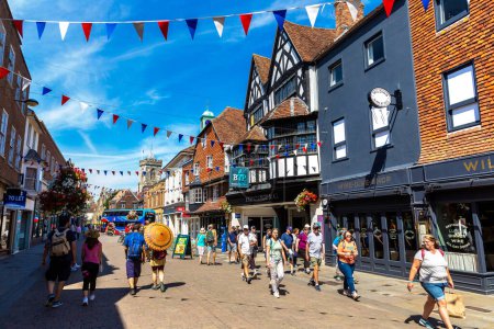 SALISBURY, UK - JUNE 17, 2022: Old fachwerk Half-timbered house and typical street in Salisbury in a sunny summer day, UK