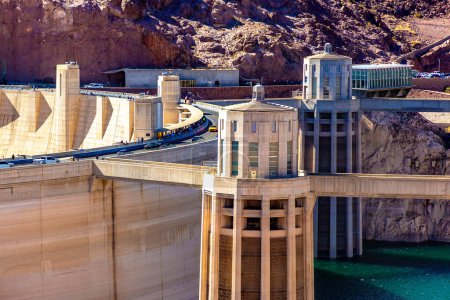 Photo for Hoover Dam and penstock towers in Colorado river at Nevada and Arizona border, USA - Royalty Free Image