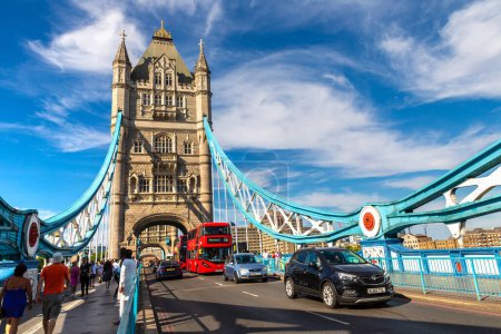 Photo for LONDON, UK - JUNE 17, 2022: The historic Tower Bridge and red double decker bus in London at sunset, UK - Royalty Free Image