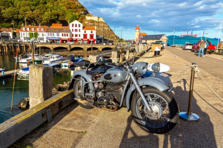 Photo for SCARBOROUGH, UK - JULY 27, 2022: Old Retro Motorcycle with sidecar in Scarborough, Yorkshire in a sunny summer day, UK - Royalty Free Image