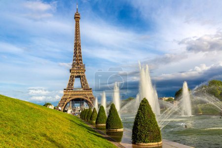 Photo for Eiffel Tower and fountains of Trocadero in Paris at sunset, France - Royalty Free Image