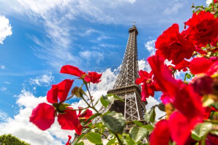 Photo for The Eiffel Tower and red roses in Paris, France in a beautiful summer day - Royalty Free Image