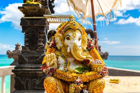 Photo for Traditional balinese Ganesha statue at beach on Bali in a sunny day, Indonesia - Royalty Free Image