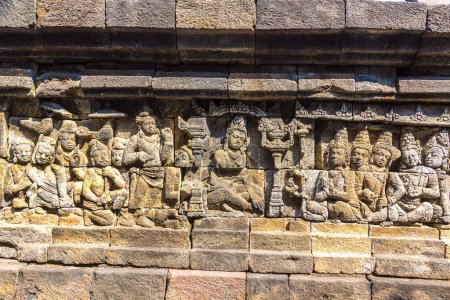 Photo for Relief of historical carvings on Buddist temple Borobudur near Yogyakarta city, Central Java, Indonesia - Royalty Free Image