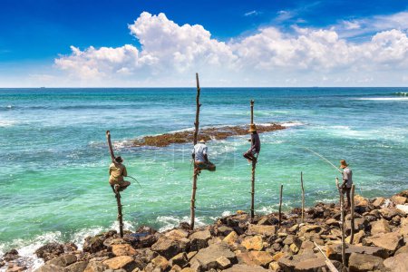 Photo for Local Fisherman fishing in traditional way at the beach in Sri Lanka - Royalty Free Image