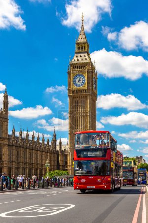 Photo for LONDON, THE UNITED KINGDOM - JUNE 26, 2022: Open-top Hop-on Hop-off Bus - City Sightseeing London on the Westminster Bridge and Big Ben and Palace of Westminster  in London, England, UK - Royalty Free Image