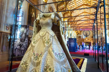 Photo for WINDSOR, UK - JUNE 19, 2022: Historical Coronation dress gown of Elizabeth II in Royal Windsor Castle in Windsor, UK - Royalty Free Image