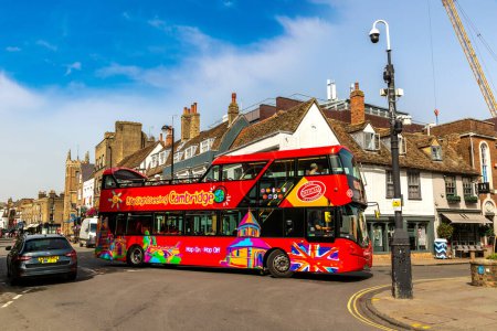 Photo for CAMBRIDGE, UK - SEPTEMBER 6, 2023: Open top sightseeing bus in Cambridge, University of Cambridge, England, United Kingdom - Royalty Free Image