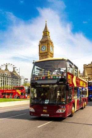 Photo for LONDON, UK - SEPTEMBER 8, 2023: Open-top sightseeing bus tours BIGBUS and Symbol of London - Big Ben in London in a sunny day, England, UK - Royalty Free Image