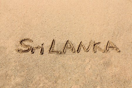 Photo for Word Sri Lanka written in a sandy on tropical beach in Sri Lanka - Royalty Free Image
