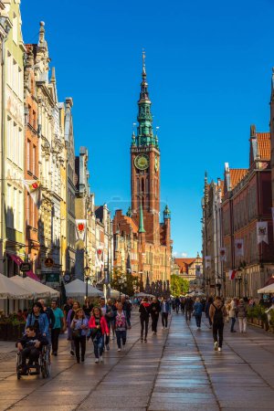 Photo for GDANSK, POLAND - SEPTEMBER 7, 2022: Street in an Old town and Town Hall in Gdansk, Poland - Royalty Free Image