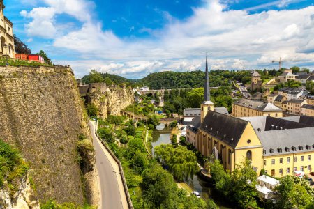 Panoramic view on Abbaye de Neumunster and St. Jean du Grund church in Luxembourg a beautiful summer day, Luxembourg