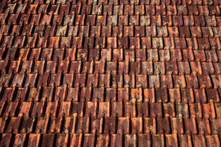 Photo for Unique clay tiles on the roof of a building in Indonesia, pattern old background - Royalty Free Image