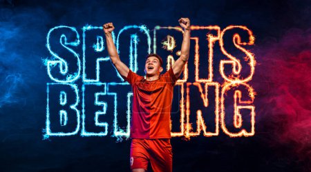 Photo for Socccer concept. Sports betting on football. Design for a bookmaker. Download banner for sports website. Soccer player on a fiery backgroun - Royalty Free Image