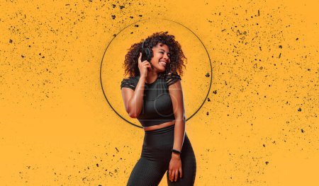 Téléchargez les photos : Download high resolution photo for advertising and promotion of electronics shop or fitness club in social networks. African american woman isolated on yellow background - en image libre de droit