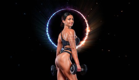 Photo for Girl athlete, bodybuilder. Download a photo to design an advertisement for a gym or a sports club - Royalty Free Image