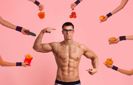 Téléchargez les photos : Athletic fit man says think what to eat. Download photo for advertising about diet, nutrition, fitness and sports. Social media post idea. Hands with burgers from fast food and vegetables - en image libre de droit