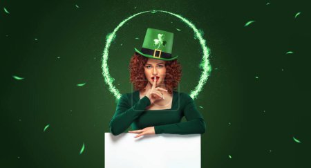 Photo for St Patrick Day. Download a photo in high resolution for advertising a beer party in a bar, night club, cafe or restaurant. Sexy oktoberfest woman on green background with banner for copy space - Royalty Free Image