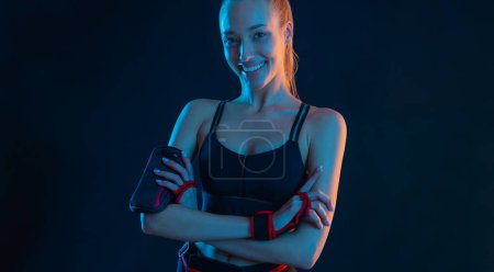 Photo for Fit woman influencer at gym. Picture for advertising a fitness club in social networks. Workout for women at home. Cover for sport motivation music. Runner concept. High resolution wallpaper. - Royalty Free Image