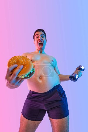 Photo for A very fat man gorges himself with cream. Obesity and eating disorder. Concept for dietetics and fitness advertising in social networks - Royalty Free Image