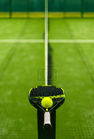 Photo for Padel tennis rackets. Sport court and balls. Download a high quality photo with paddle for the design of a sports app or soical media advertisement - Royalty Free Image