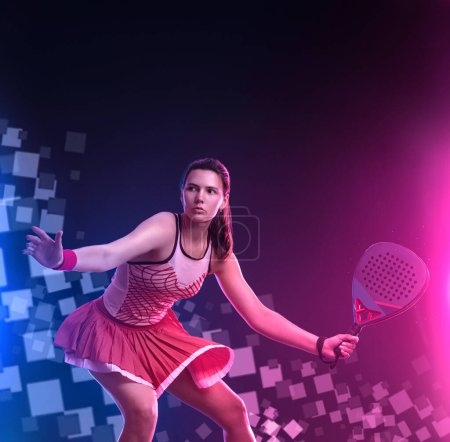 Photo for Padel tennis player with racket. Girl teenager athlete with racket on court with neon colors. Sport concept. Download a high quality photo for the design of a sports app or betting site - Royalty Free Image