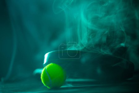 Padel tennis rackets. Sport court and balls. Download a high quality photo with paddle for the design of a sports app or social media advertisement