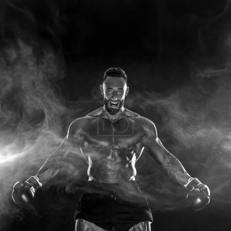 Foto de Hombre atleta boxeador. Descargar foto de alta resolución para la publicidad de apuestas deportivas en línea. Imagen para anuncio una oficina de casas de apuestas - Imagen libre de derechos