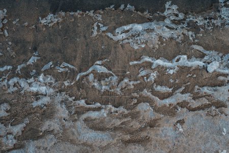 Photo for Lake shore with ice on sand texture - Royalty Free Image