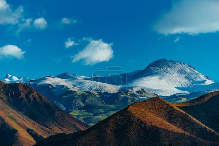 Photo for Picturesque mountain landscape with snowy peaks at summer day - Royalty Free Image