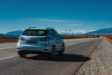 Photo for Mountains travel, car blurred motion - Royalty Free Image