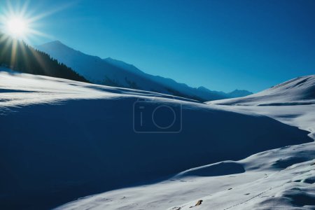Photo for Mountain valley covered in snow on a sunny winter day - Royalty Free Image