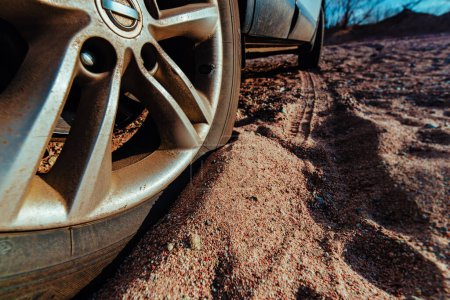 Photo for Car wheel on sand close-up view, offroad concept - Royalty Free Image