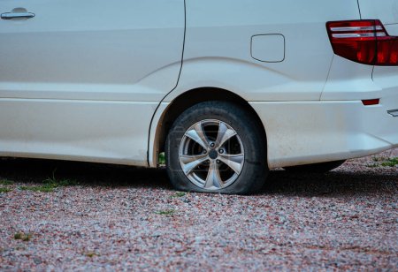 Photo for Flat tire on offroad parked car - Royalty Free Image
