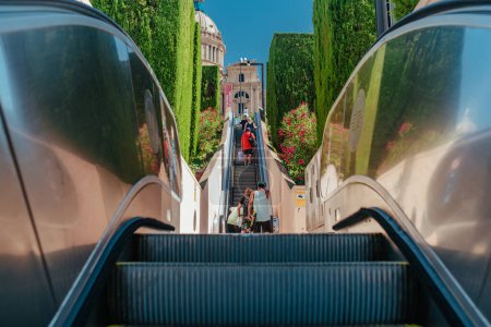 Photo for Barcelona, Spain - July 19, 2018: Street escalator to National Palace on Montjuic hill - Royalty Free Image