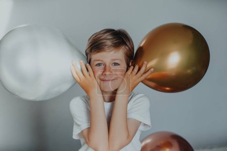 Photo for Portrait of cheerful smiling boy with balloons - Royalty Free Image