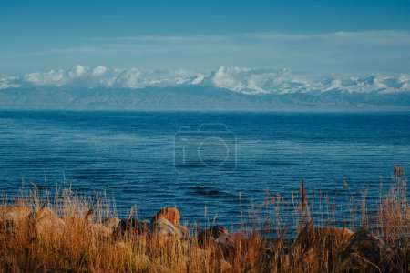 Idyllic lake landscape with mountains in spring, Issyk-kul, Kyrgyzstan