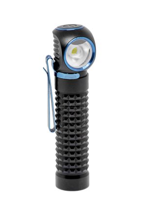 Foto de Image of a black metal pocket flashlight with a clip on a white background - Imagen libre de derechos