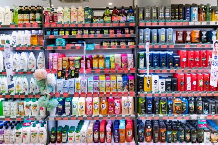 Photo for LATVIA, RIGA, MAY, 2023: Shelves with shampoos and conditioners with reduced prices on sale in Rimi Baltic hypermarket, Riga. Latvia. Rimi Baltic is a major retail operator in the Baltic states - Royalty Free Image