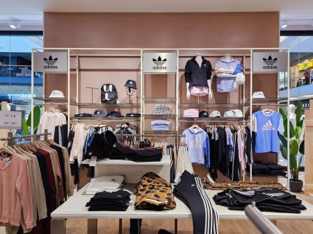 Photo for TURKEY, ISTANBUL, 10, APRIL, 2023: Modern interior of Adidas store with a new collection of clothes in Istanbul International Airport. Turkey. - Royalty Free Image