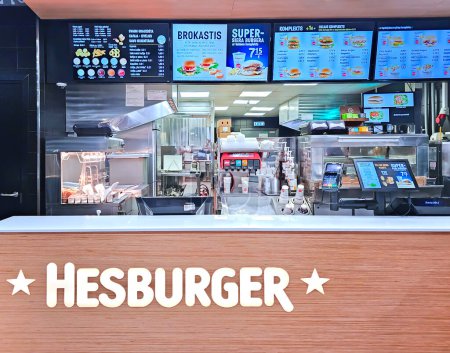 Photo for Latvia, Riga, 25, September, 2023: Hesburger fast food counter with electronic menu and cash registers in Riga, Latvia. - Royalty Free Image