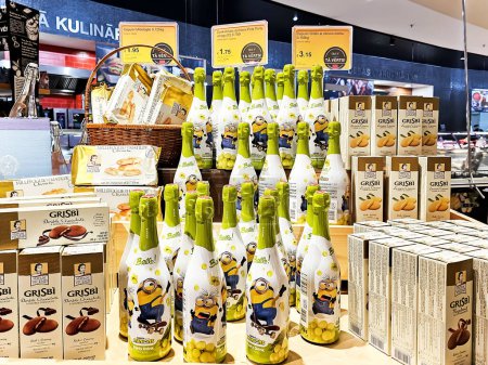 Photo for LATVIA, RIGA, 23, DECEMBER, 2023: Minions grape party drink and Grisbi cookies on a pallet in a SKY and MORE shopping center in Riga. Latvia - Royalty Free Image