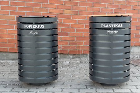 Photo for Paper and plastic waste bins on street. - Royalty Free Image