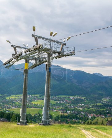 Photo for Chair lift on Gubalowka Hill with lovely view to Tatra Mountains Zakopane Poland. - Royalty Free Image