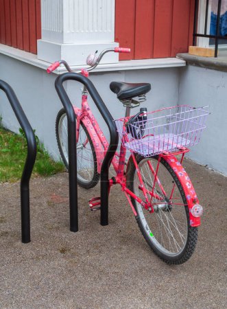 Photo for Pink women bicycle parking at home. - Royalty Free Image