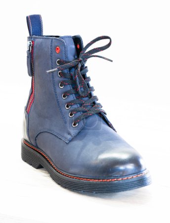 Foto de One blue boot on white. - Imagen libre de derechos