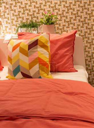 Photo for Orange color cotton bedroom textiles . Modern bedroom interior . - Royalty Free Image